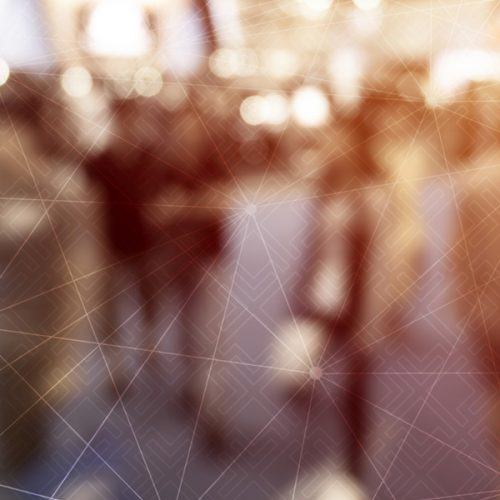 blurred image of people walking