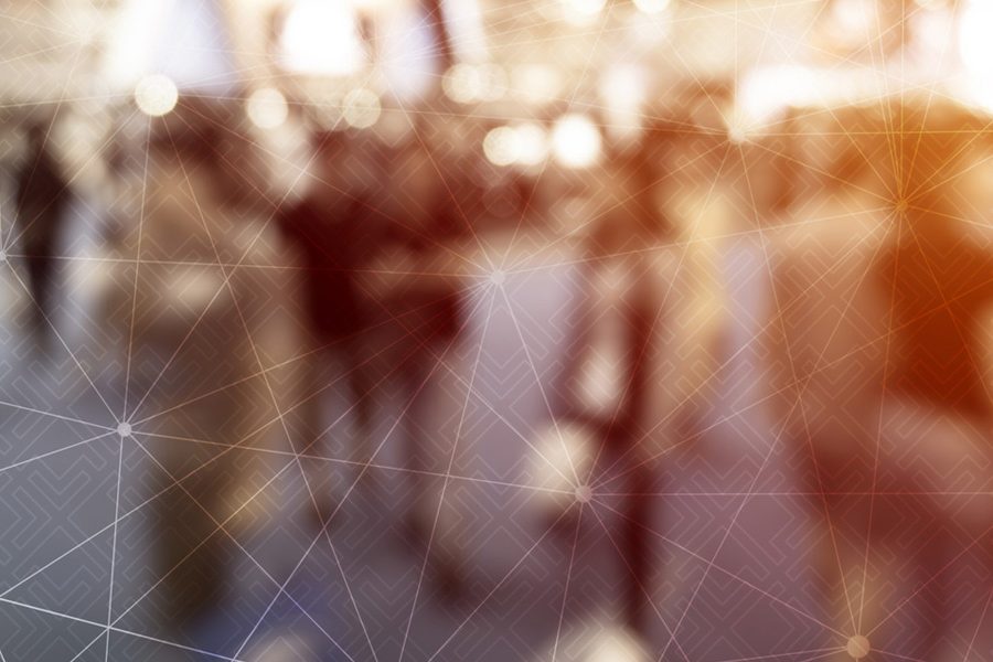 blurred image of people walking