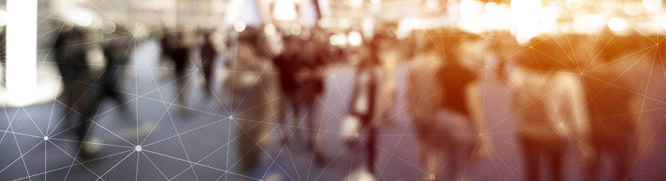 blurred image of people walking