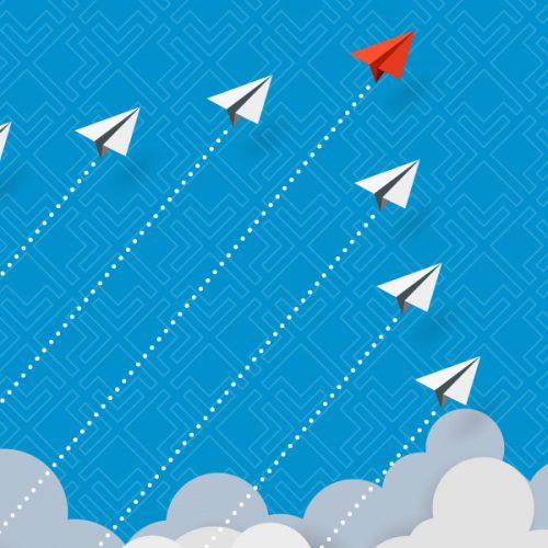 paper planes flying from the clouds