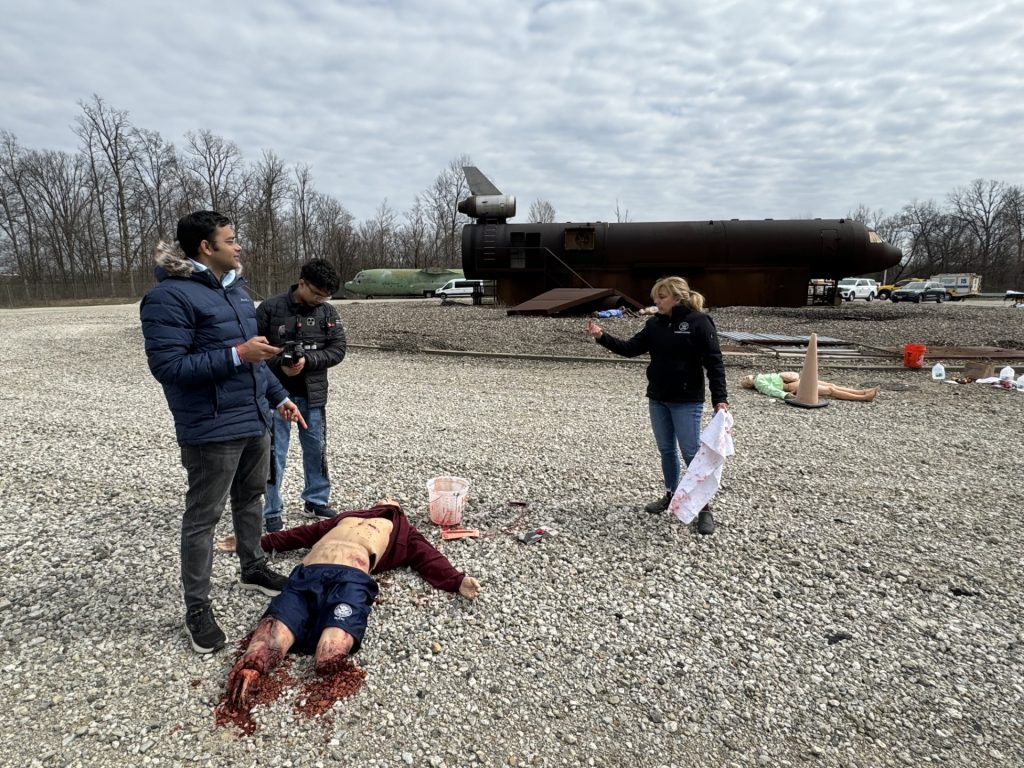 Kimberly, at Pittsburgh International Airport with Carnegie Mellon students (and mannequins), working as an instructor for the DARPA Triage Challenge to capture data and test payload sensor choices in different environments.